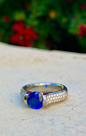 2.33 ct. GIA Blue Sapphire set in Omega 3-Row Pave