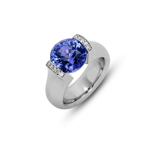 5.66 ct. Unheated Blue Sapphire set in Omega Round
