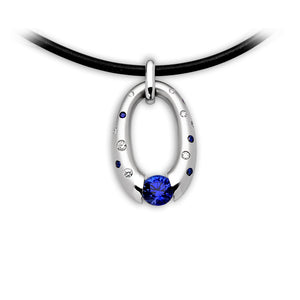 Small Oval Pendant with Scattered Melee and Tension-Set Blue Sapphire